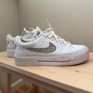 Nike Legacy Platform White Sneakers with Black Patterned Swoosh